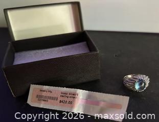 MaxSold Auction: Jewelry Mfg. Sterling Silver Size 8 Ring with Color-Change Topaz - Hamilton (Ontario, Canada) SELLER MANAGED Downsizing Online Auction - Cameron Avenue South