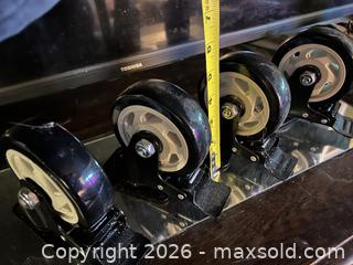 MaxSold Auction: Set of 4 Swivel Caster Wheels on Metal Plates with Brakes - Hamilton (Ontario, Canada) SELLER MANAGED Downsizing Online Auction - Cameron Avenue South