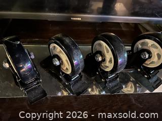 MaxSold Auction: Set of 4 Swivel Caster Wheels on Metal Plates with Brakes - Hamilton (Ontario, Canada) SELLER MANAGED Downsizing Online Auction - Cameron Avenue South