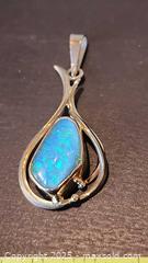 MaxSold Auction: 9kt pendent with firey blue stone - Elgin (Ontario, Canada) SELLER MANAGED Estate Sale Online Auction - Main