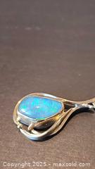 MaxSold Auction: 9kt pendent with firey blue stone - Elgin (Ontario, Canada) SELLER MANAGED Estate Sale Online Auction - Main