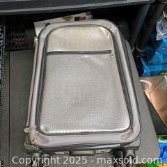 MaxSold Auction: Wheeled suit case  - Waterford (New Jersey, USA) SELLER MANAGED Downsizing Online Auction - Chew Road