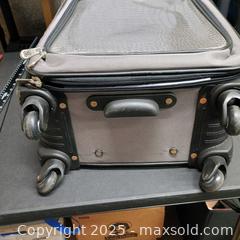 MaxSold Auction: Wheeled suit case  - Waterford (New Jersey, USA) SELLER MANAGED Downsizing Online Auction - Chew Road