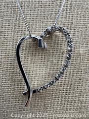 MaxSold Auction: 18K White Gold Necklace and Diamond Heart Pendant. 13 Hand Set diamonds. - Oakville (Ontario, Canada) PARTNER MANAGED Estate Sale Online Auction - Lakeshore Road West (Shipping Available)                     