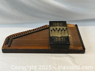 MaxSold Auction: Autoharp Style #2N Model. With Finger Pick and Manual - Oakville (Ontario, Canada) PARTNER MANAGED Estate Sale Online Auction - Lakeshore Road West (Shipping Available)                     
