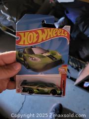MaxSold Auction: Hot Wheels Then and Now Metallic Green Exotic Sports Car 1:64 - Kingston (Ontario, Canada) SELLER MANAGED Reseller Online Auction - Development Drive (STORAGE)