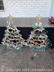 MaxSold Auction: Pair of metal framed Christmas tree decorations for the yard - Cocoa (Florida, USA) SELLER MANAGED Estate Sale Online Auction - Broadcast Court