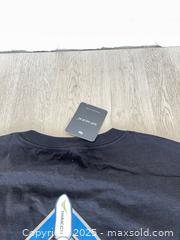 MaxSold Auction: SpaceX falcon nine THAICOM 8 black mission T-shirt - Cocoa (Florida, USA) SELLER MANAGED Estate Sale Online Auction - Broadcast Court