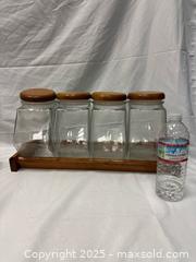 MaxSold Auction: Vintage Farmhouse Large Glass Storage Jars with Wooden Lids and Rack - Millbrae (California, USA) SELLER MANAGED Estate Sale Online Auction - El Camino Real