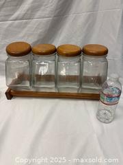 MaxSold Auction: Vintage Farmhouse Large Glass Storage Jars with Wooden Lids and Rack - Millbrae (California, USA) SELLER MANAGED Estate Sale Online Auction - El Camino Real