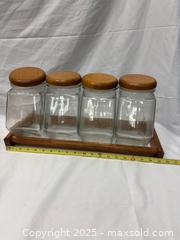MaxSold Auction: Vintage Farmhouse Large Glass Storage Jars with Wooden Lids and Rack - Millbrae (California, USA) SELLER MANAGED Estate Sale Online Auction - El Camino Real