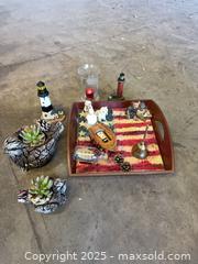 MaxSold Auction: Mixed Nautical Home Decor Lot: Tray, Planters, Lighthouses, Glass - Garden City (Georgia, USA) SELLER MANAGED Downsizing Online Auction -  Bryce Industrial Drive