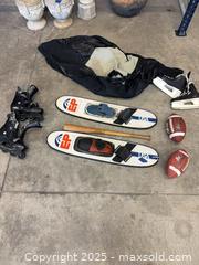MaxSold Auction: Mixed Sporting Goods Lot: Water Skis, Skates, Footballs, Wetsuit - Garden City (Georgia, USA) SELLER MANAGED Downsizing Online Auction -  Bryce Industrial Drive