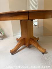 MaxSold Auction: Round Wooden kitchen table  A - London (Ontario, Canada) PARTNER MANAGED Downsizing Online Auction - Bloomfield Drive