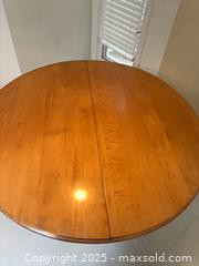 MaxSold Auction: Round Wooden kitchen table  A - London (Ontario, Canada) PARTNER MANAGED Downsizing Online Auction - Bloomfield Drive