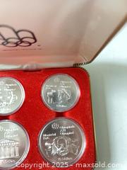 MaxSold Auction: Four 1976 Olympic commemorative silver coins  - Toronto (Ontario, Canada) SELLER MANAGED Downsizing Online Auction - Dingwall Avenue