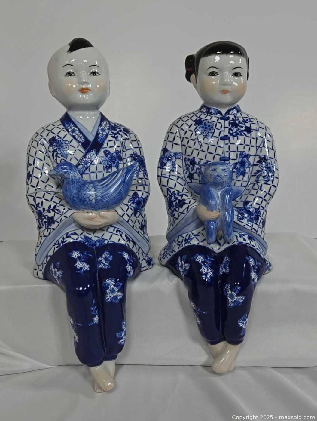 Pair of White and Blue Glazed Porcelain Figurines | Ottawa (Ontario ...