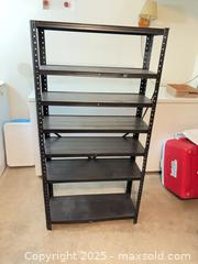 MaxSold Auction: Black Metal Freestanding 7-Shelf Storage Rack - Carleton Place  (Ontario, Canada) SELLER MANAGED Downsizing Online Auction -Goodwood Crescent