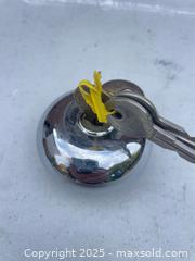 MaxSold Auction: Vintage Chrome Gas Cap with Keys  - Vaughan (Ontario, Canada) SELLER MANAGED Downsizing Online Auction -  Kingsbridge Circle
