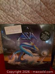 MaxSold Auction: 2- ASIA Record Albums - 1st super Group of the 1980's  - Greece (New York, USA) SELLER MANAGED Downsizing Online Auction -  Joanne Drive (STORAGE)