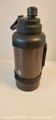 MaxSold Auction: Large Black Water Bottle w/handle   - Rockaway (New Jersey, USA) SELLER MANAGED Downsizing Online Auction - Miami Trail