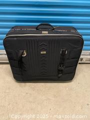 MaxSold Auction: Charles Delon Black Hard-Sided Suitcase - Vancouver (British Columbia, Canada) SELLER MANAGED Reseller Online Auction - East 7th Avenue (STORAGE)              