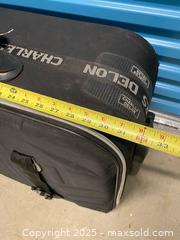 MaxSold Auction: Charles Delon Black Hard-Sided Suitcase - Vancouver (British Columbia, Canada) SELLER MANAGED Reseller Online Auction - East 7th Avenue (STORAGE)              