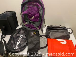 MaxSold Auction:  Lot of Bags &#38; Backpacks – Reebok, Parco, DoorDash, Planet Fitness – Mixed Styles - Vancouver (British Columbia, Canada) SELLER MANAGED Reseller Online Auction - East 7th Avenue (STORAGE)              