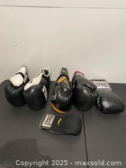 MaxSold Auction: Mixed unpaired Boxing Glove Lot – Everlast, Starpro, RDX - Vancouver (British Columbia, Canada) SELLER MANAGED Reseller Online Auction - East 7th Avenue (STORAGE)              