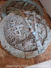 MaxSold Auction: Assorted Garden Plaques & Stepping Stones A - Ottawa (Gloucester)(Ontario, Canada) PARTNER MANAGED Moving Online Auction - Southpark Drive