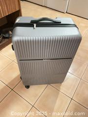 MaxSold Auction: Swiss Air large suitcase  - Greater Sudbury (Ontario, Canada) PARTNER MANAGED Estate Sale Online Auction - Logan Avenue