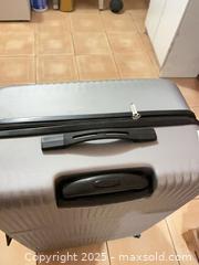 MaxSold Auction: Swiss Air large suitcase  - Greater Sudbury (Ontario, Canada) PARTNER MANAGED Estate Sale Online Auction - Logan Avenue