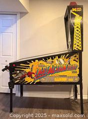 MaxSold Auction: Last Action Hero Pinball Machine  - Hamilton (Ontario, Canada) SELLER MANAGED Downsizing Online Auction -  Miller Drive
