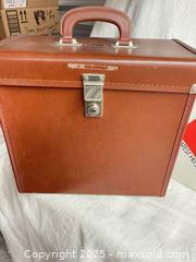 MaxSold Auction: Vintage Pioneer Vinyl Record Storage Carrying Case for 30 Records Brown - 103128 - Ottawa (Ontario, Canada) SELLER MANAGED Estate Sale Online Auction - Frank Nighbor Place