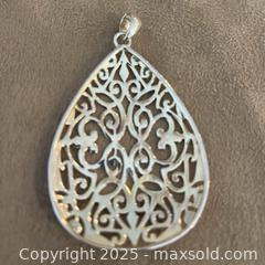MaxSold Auction: Sterling Silver Pendant - London (Ontario, Canada) SELLER MANAGED Downsizing Online Auction - Doon Drive
