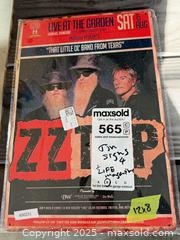 MaxSold Auction: Decorative Metal Signs & Vintage Prints: Genesis, ZZ Top, Elvis B - Brampton (Ontario, Canada) Estate Sale Online Auction - Upper Highlands Drive