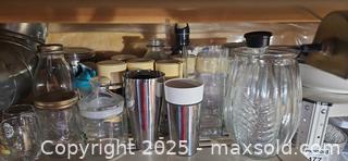 MaxSold Auction: Lot of glass jars, pitcher, bottles, tumblers, vases, and cutlery set B - Brampton (Ontario, Canada) Estate Sale Online Auction - Upper Highlands Drive