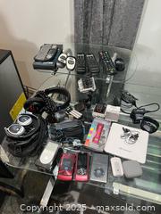 MaxSold Auction: Mixed lot of small portable electronics (GoPro, Motorola, Sony) B - Brampton (Ontario, Canada) Estate Sale Online Auction - Upper Highlands Drive