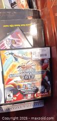 MaxSold Auction: Mixed media lot: CDs, DVDs, Video Games, Books in Orange Storage Tub B - Brampton (Ontario, Canada) Estate Sale Online Auction - Upper Highlands Drive