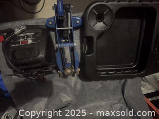 MaxSold Auction: Car creeper;Blue Steel Trolley Jack, Likely 2–3 Ton, Low-Profile; battery charger: oil - Halton Hills (Ontario, Canada) SELLER MANAGED Downsizing Online Auction - Barber Drive