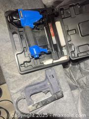 MaxSold Auction: Pneumatic Brad Nailer and Corded Electric Staple Tool, 2 pcs - Halton Hills (Ontario, Canada) SELLER MANAGED Downsizing Online Auction - Barber Drive