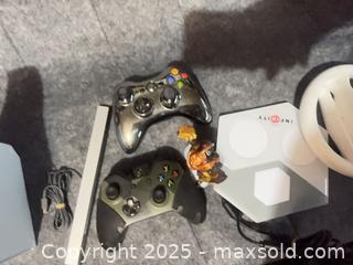 MaxSold Auction: Wii system;Mixed Controllers &#38; Disney Infinity Lot (Xbox 360, Wii Wheel, Base &#38; Figure) - Halton Hills (Ontario, Canada) SELLER MANAGED Downsizing Online Auction - Barber Drive