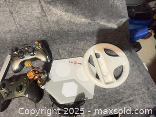 MaxSold Auction: Wii system;Mixed Controllers &#38; Disney Infinity Lot (Xbox 360, Wii Wheel, Base &#38; Figure) - Halton Hills (Ontario, Canada) SELLER MANAGED Downsizing Online Auction - Barber Drive