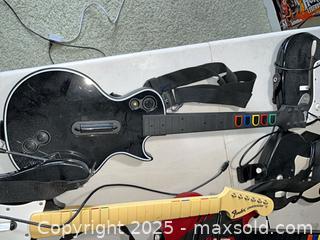 MaxSold Auction: Xbox 360 Guitar &#38; Drum Controllers + 4 Game Discs - Cupertino (California, USA) PARTNER MANAGED Estate Sale Online Auction - Maria Rosa Way