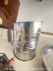 MaxSold Auction: Vintage Hand-crank Flour Sifter, Stainless Steel Serving Tray, 9" Cake Pan, Cheese Grater, - Point Edward (Ontario, Canada) PARTNER MANAGED Estate Sale Online Auction -  Michigan Avenue