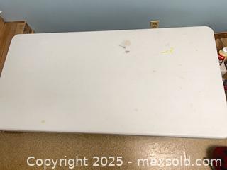 MaxSold Auction: White Plastic Folding Table with Metal Legs  - Point Edward (Ontario, Canada) SELLER MANAGED Estate Sale Online Auction -  Michigan Avenue