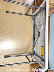MaxSold Auction: White Plastic Folding Table with Metal Legs  - Point Edward (Ontario, Canada) SELLER MANAGED Estate Sale Online Auction -  Michigan Avenue
