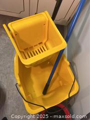 MaxSold Auction: Yellow Mop Bucket With Wringer, Mops - Point Edward (Ontario, Canada) PARTNER MANAGED Estate Sale Online Auction -  Michigan Avenue