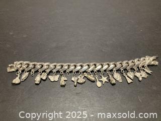 MaxSold Auction: Heavy Solid Sterling Silver Charm Bracelet - North Vancouver (British Columbia, Canada) SELLER MANAGED Downsizing Online Auction - 14th Street West