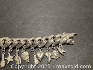 MaxSold Auction: Heavy Solid Sterling Silver Charm Bracelet - North Vancouver (British Columbia, Canada) SELLER MANAGED Downsizing Online Auction - 14th Street West